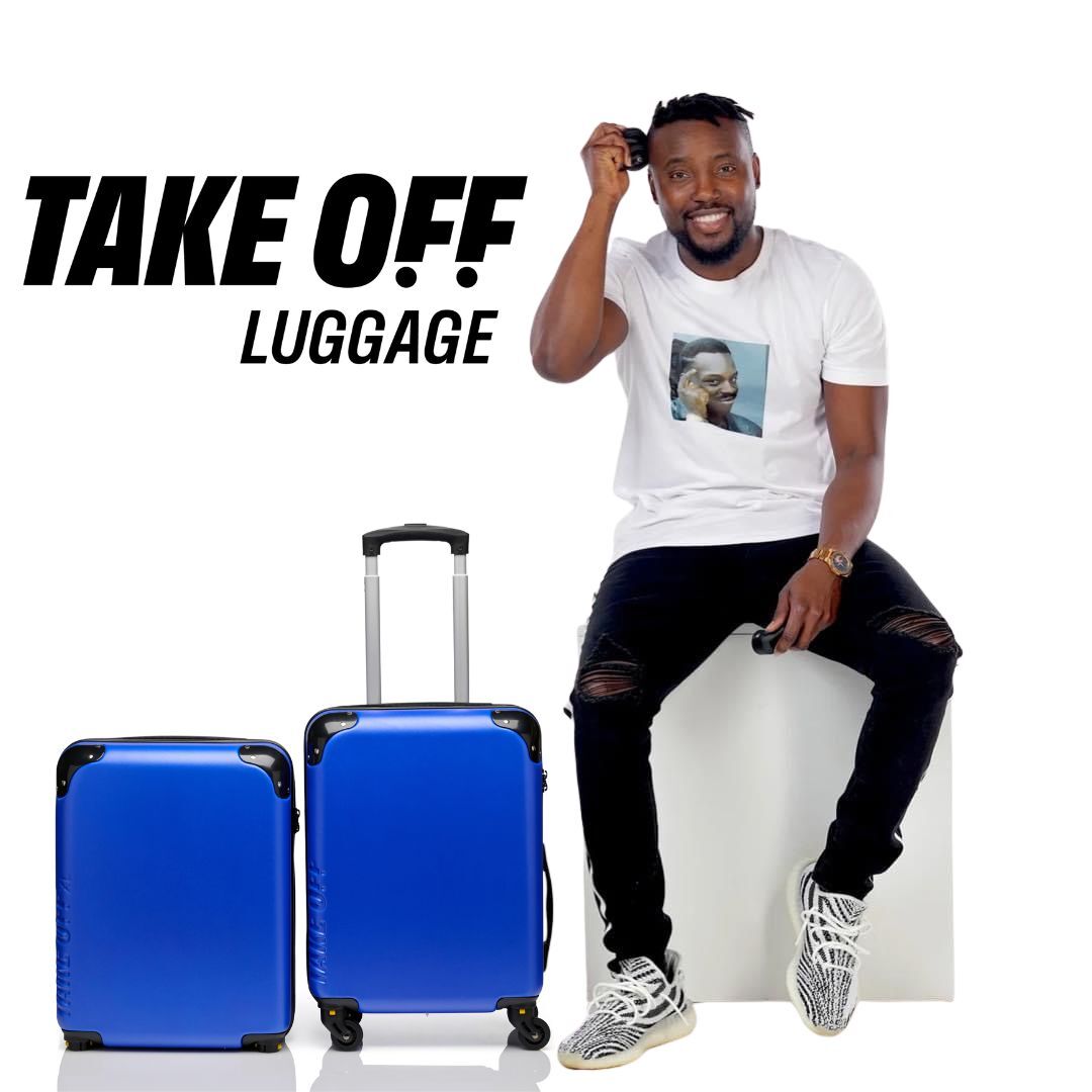 Take Off Luggage Founder sits next to two Take OFF Luggage Personal Items, one with the wheels on and one with the wheels off. 